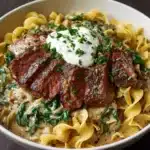 Garlic Butter Steak with Egg Noodles and Spinach Salad Recipe
