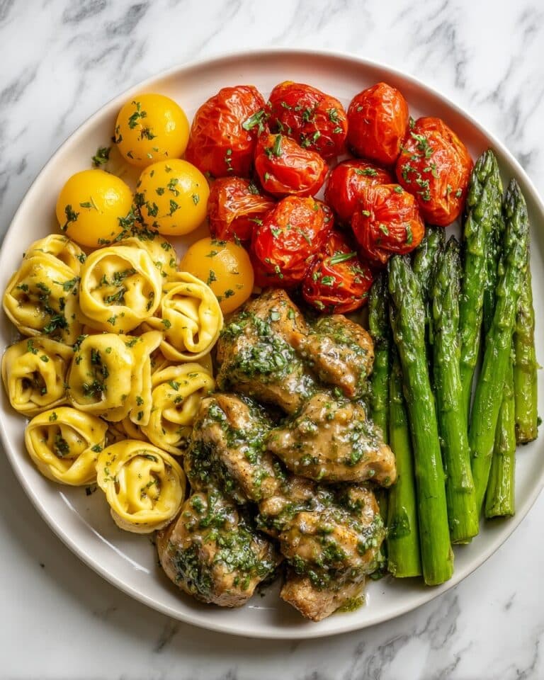 Pesto Chicken Tortellini with Sun-Dried Tomatoes, Asparagus, and Cherry Tomatoes Recipe