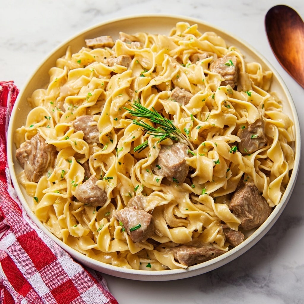 Easy Crockpot Cheesy Beef and Noodles Recipe - Recipe Image