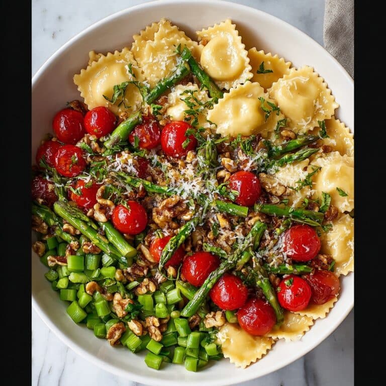 Ravioli with Tomatoes, Asparagus, Garlic, and Herbs Recipe