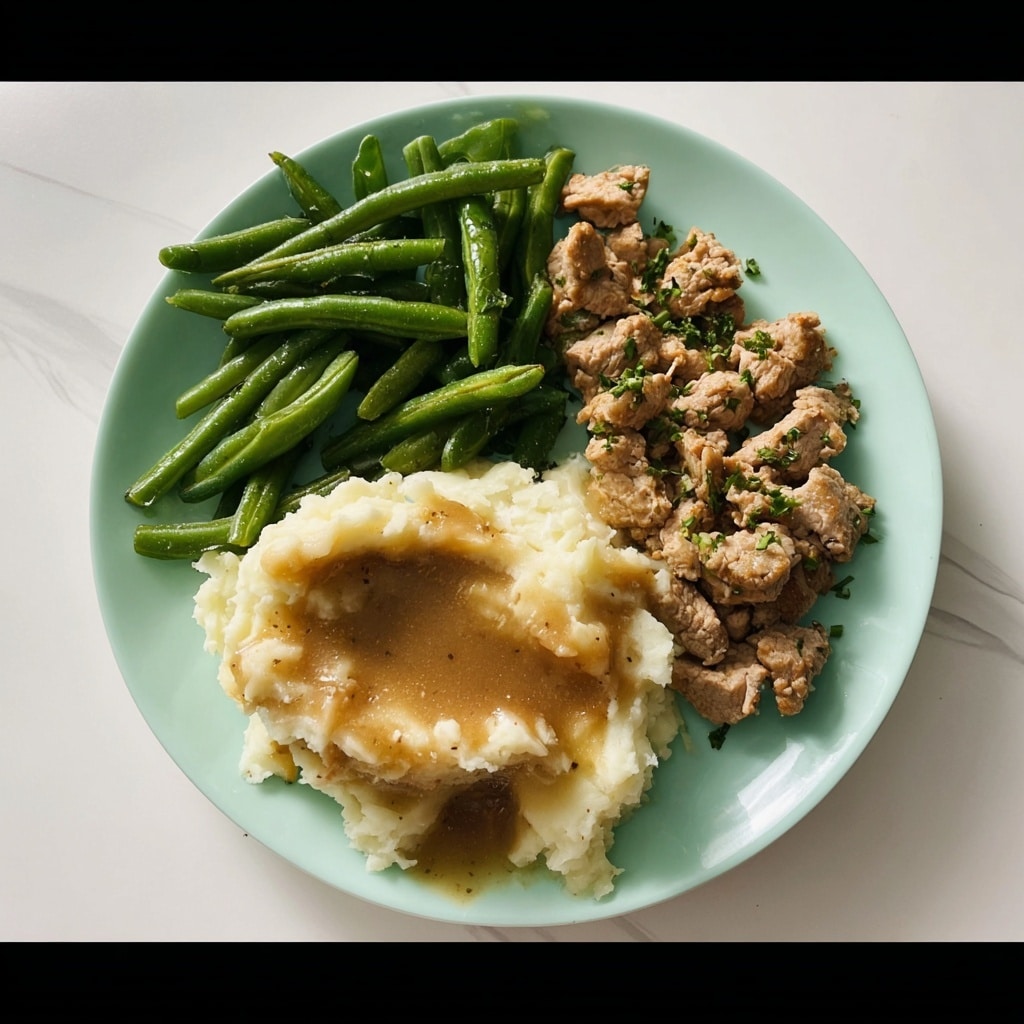Garlic Butter Steak Bites with Mashed Potatoes and Green Beans Recipe - Recipe Image