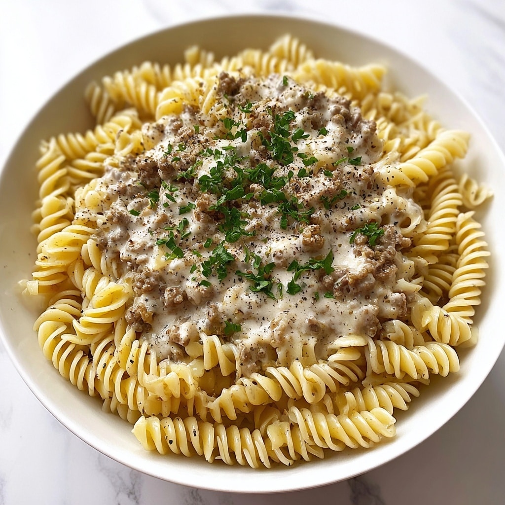 Beef and Rotini in Garlic Parmesan Sauce Recipe - Recipe Image